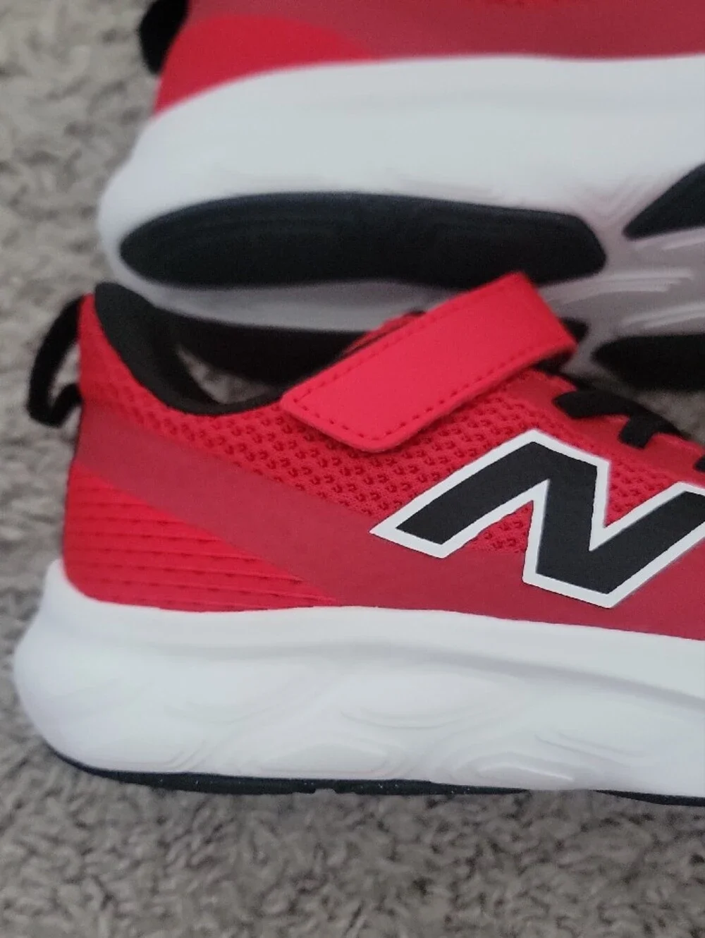 New Balance Kids Red and Black Sneakers